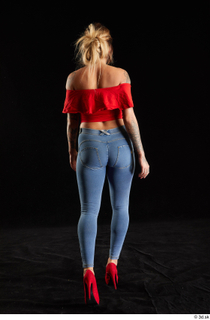 Daisy Lee 1 back view blue jeans dressed red high…